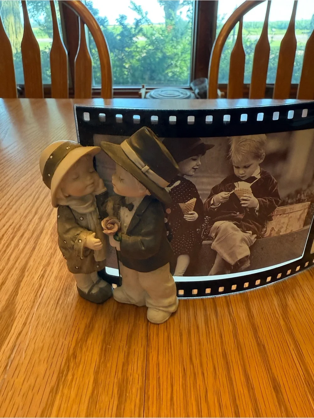 Vintage Black Filmstrip Photo Frame with Figurine Accent